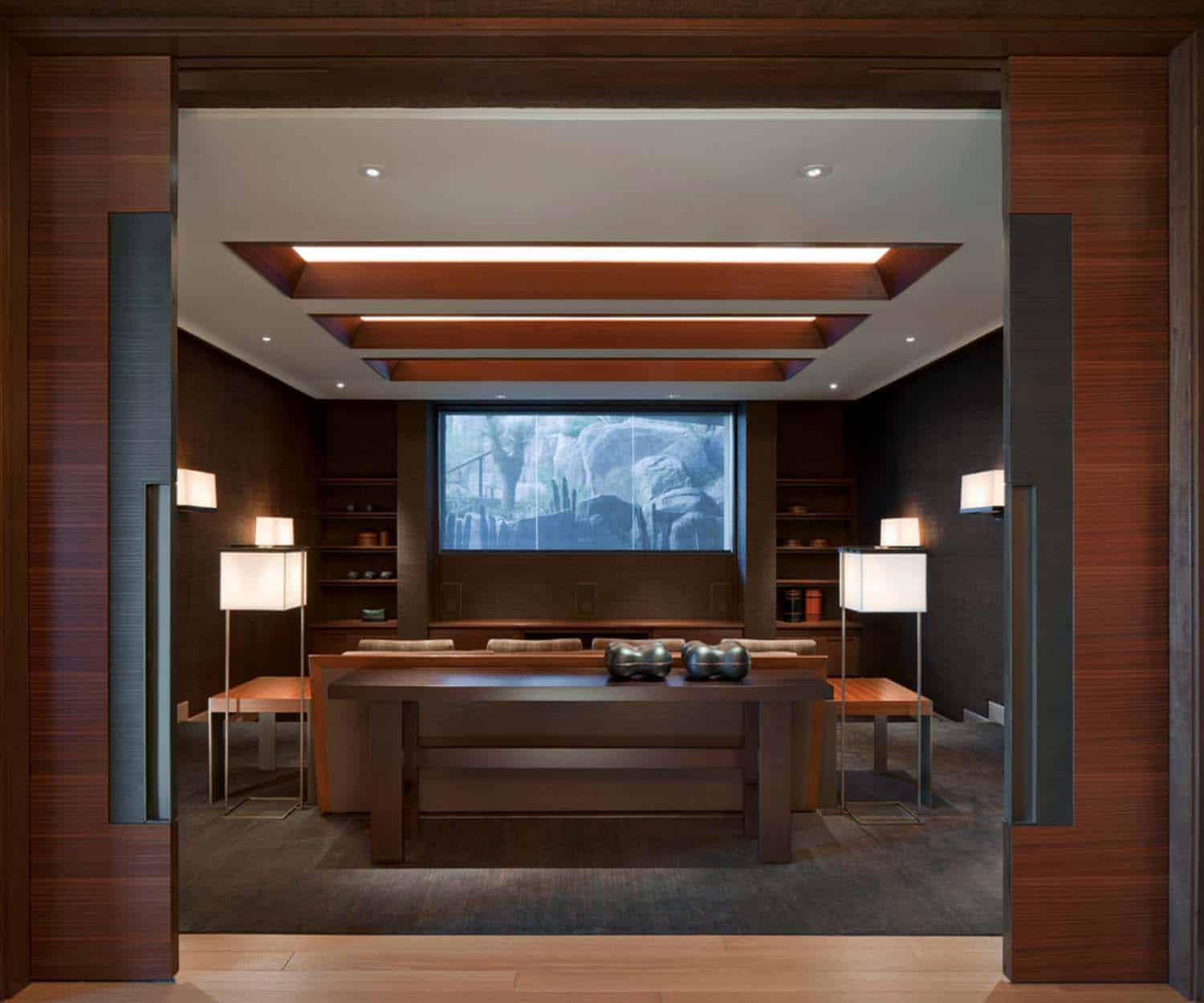 Modern desert home set on a rocky hillside with spectacular city views-13