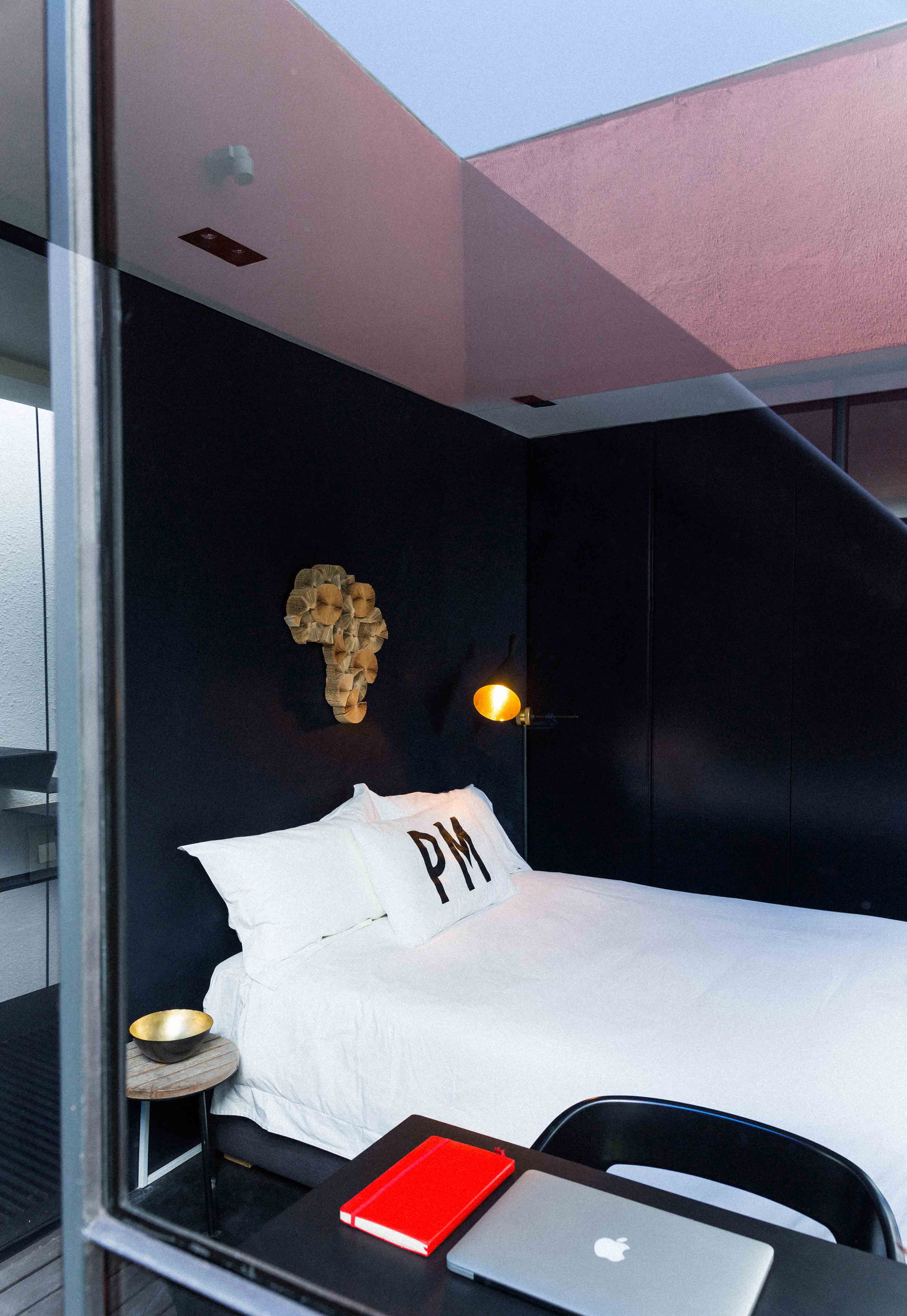 Rooftop pool and vertical garden feature in Fold Architects' pink Cape Town house-27