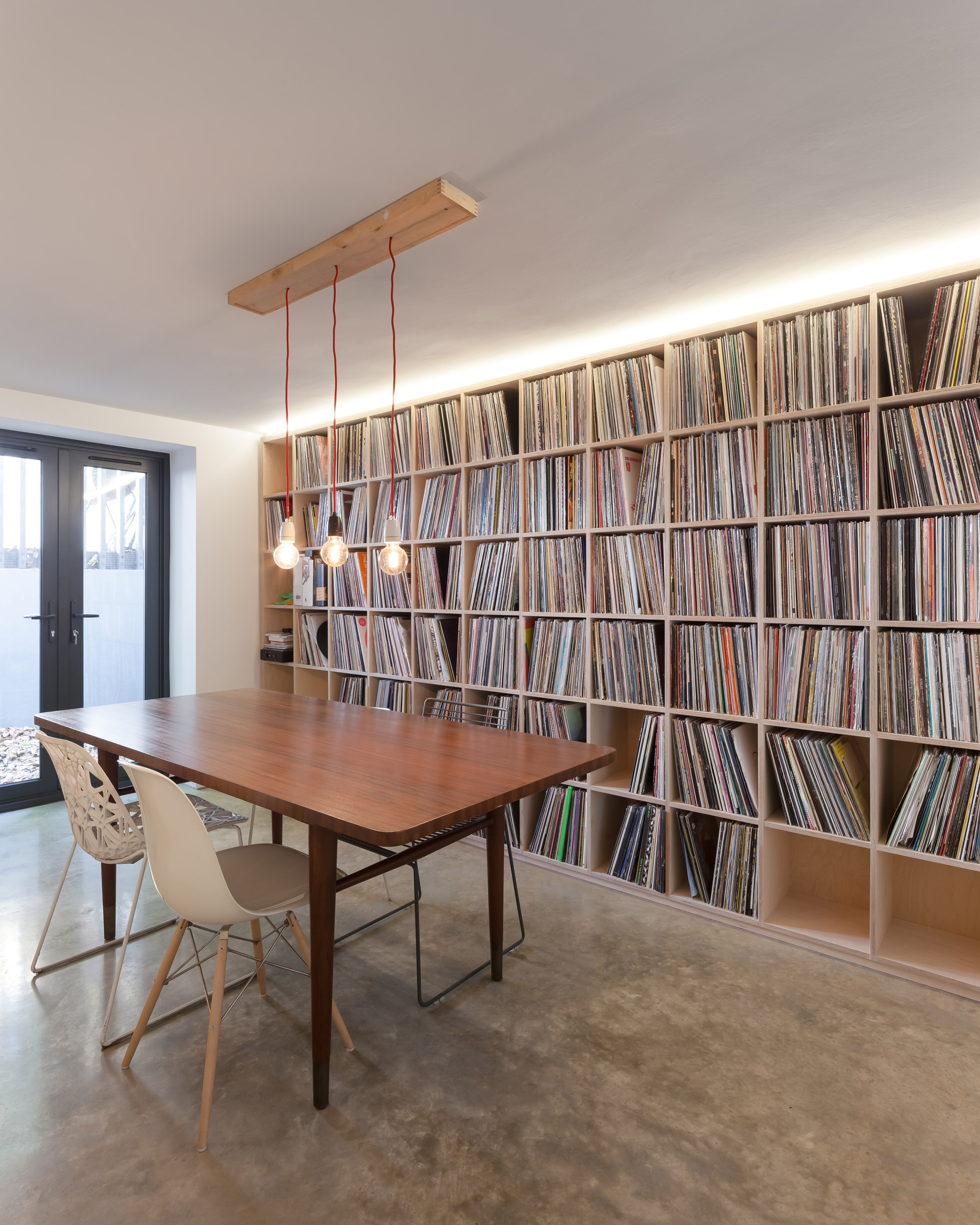Yellow kitchen brightens basement of north London home-16