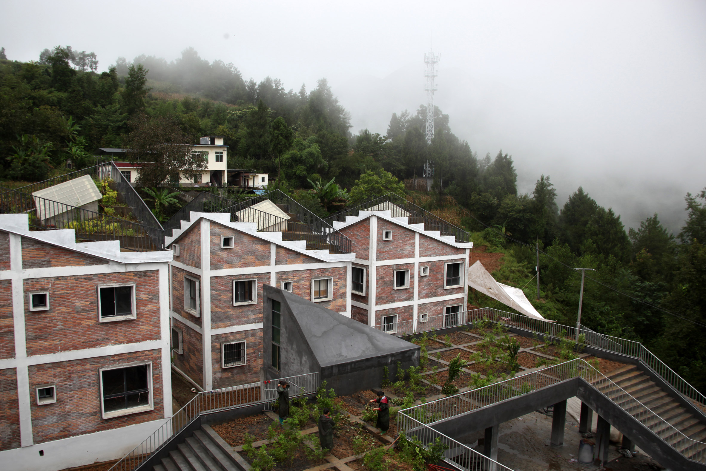 Rural Urban Framework builds post-disaster housing in China-3