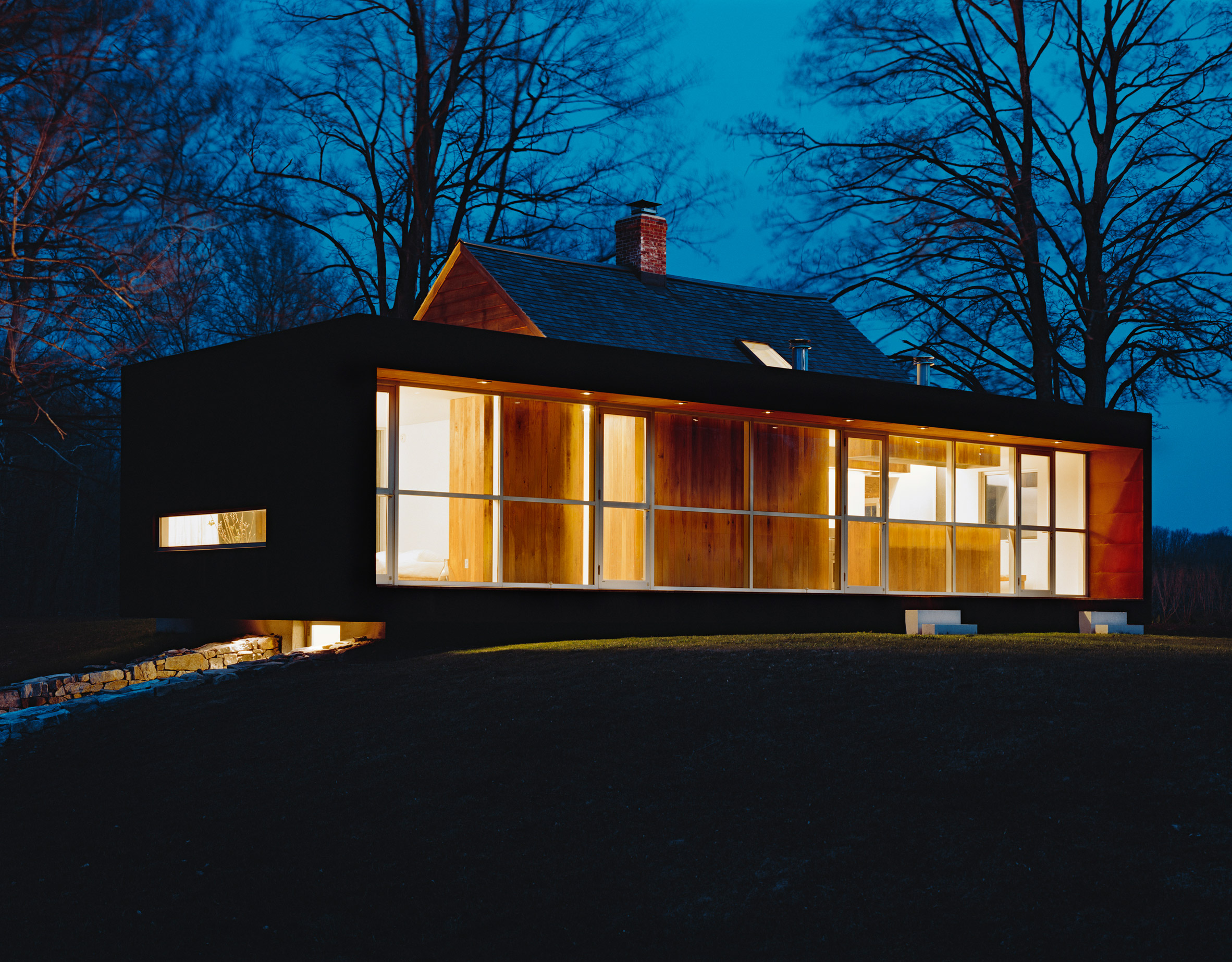 Messana O'Rorke Architects extends colonial New York homestead with weathering-steel annex-37