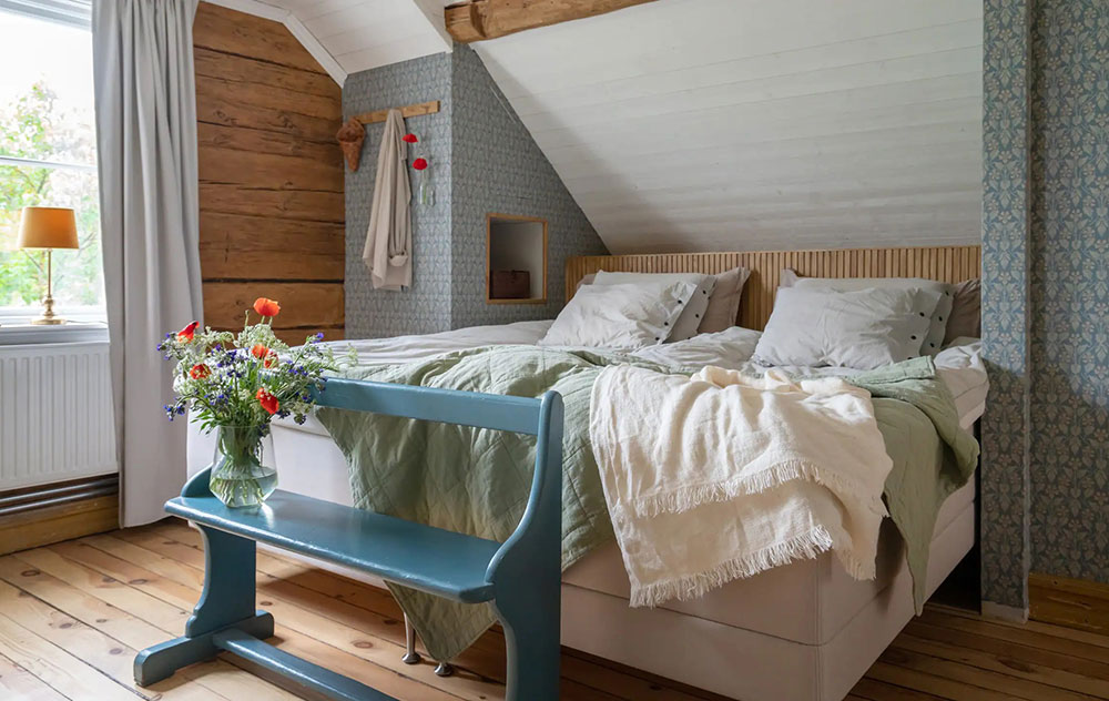 瑞典 19 世纪农场小屋的温馨改造-14