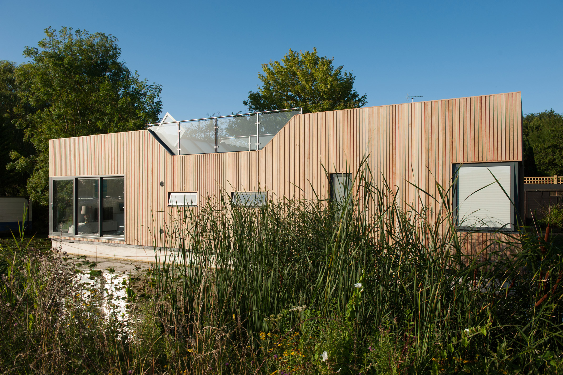 Baca Architects moors wooden floating home on Chichester Canal-2