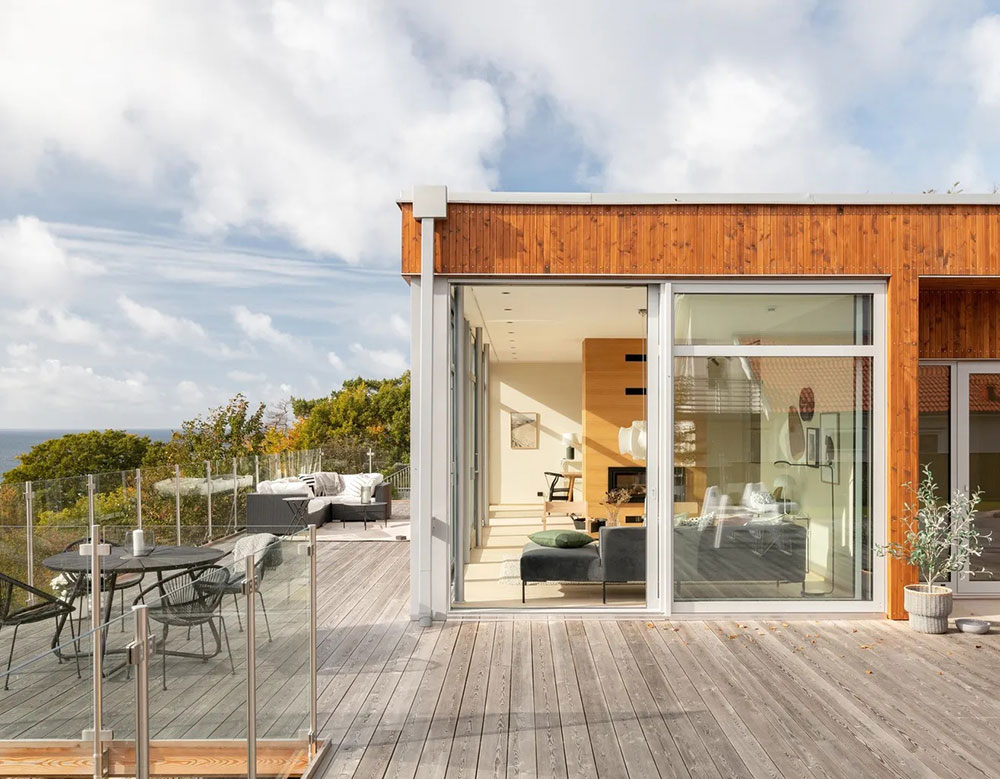 瑞典现代海景公寓 | 阳光倾洒的玻璃海洋-2