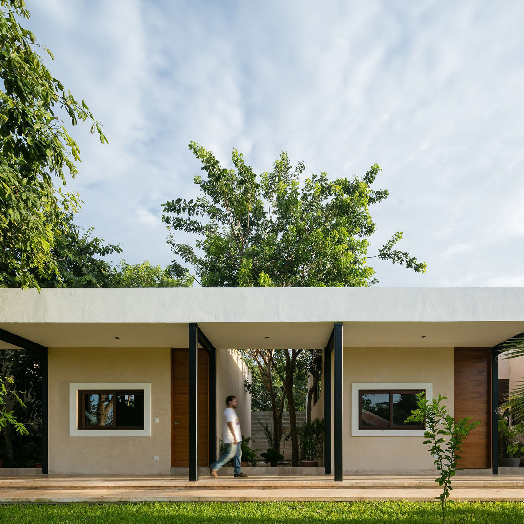 Steel colonnades create sheltered outdoor spaces at Mexican hacienda-0