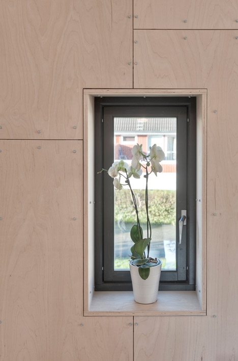 TYIN Tegnestue's lopsided house extension creates extra space upstairs-21