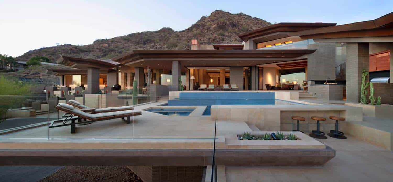 Modern desert home set on a rocky hillside with spectacular city views-28