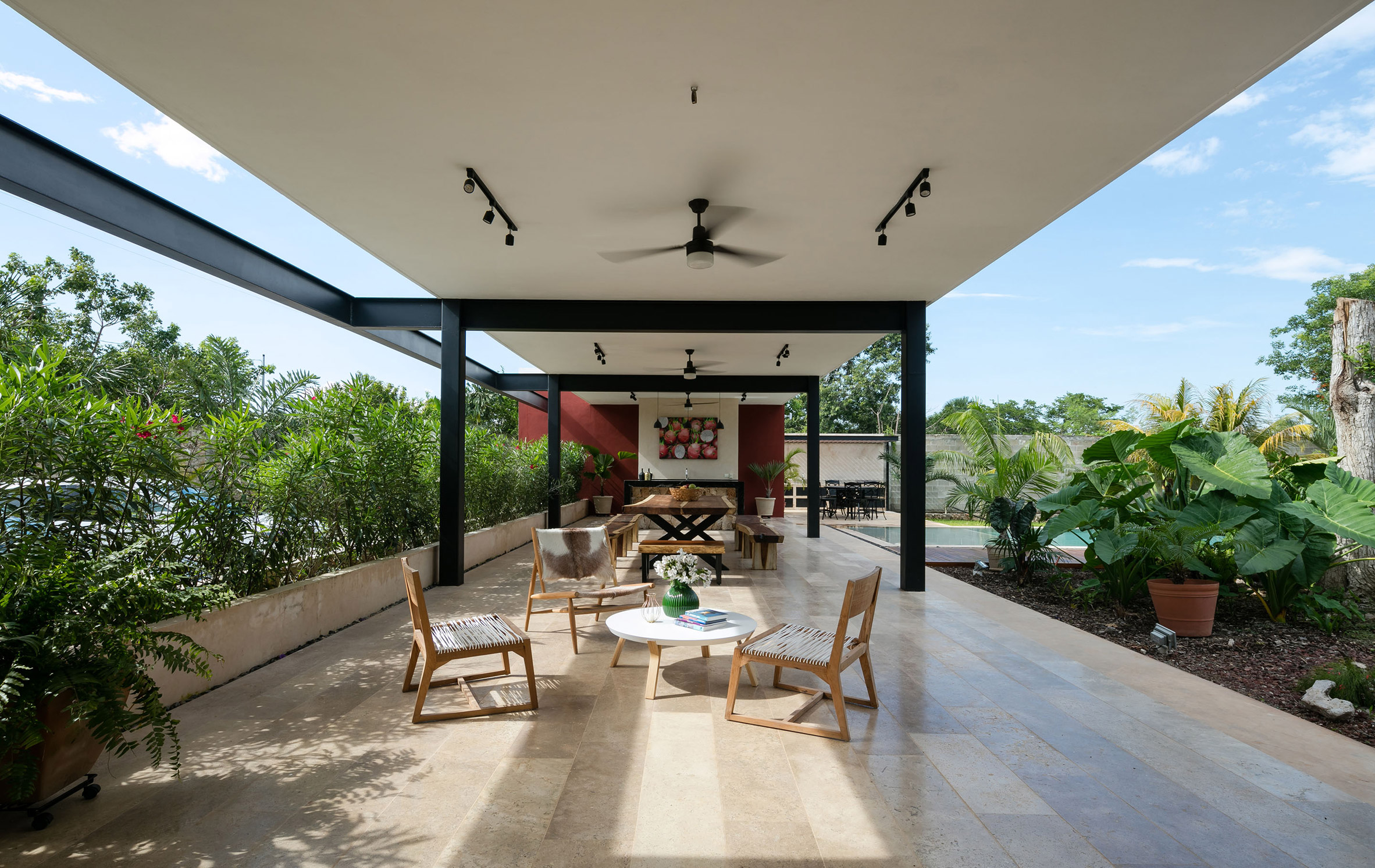 Steel colonnades create sheltered outdoor spaces at Mexican hacienda-10
