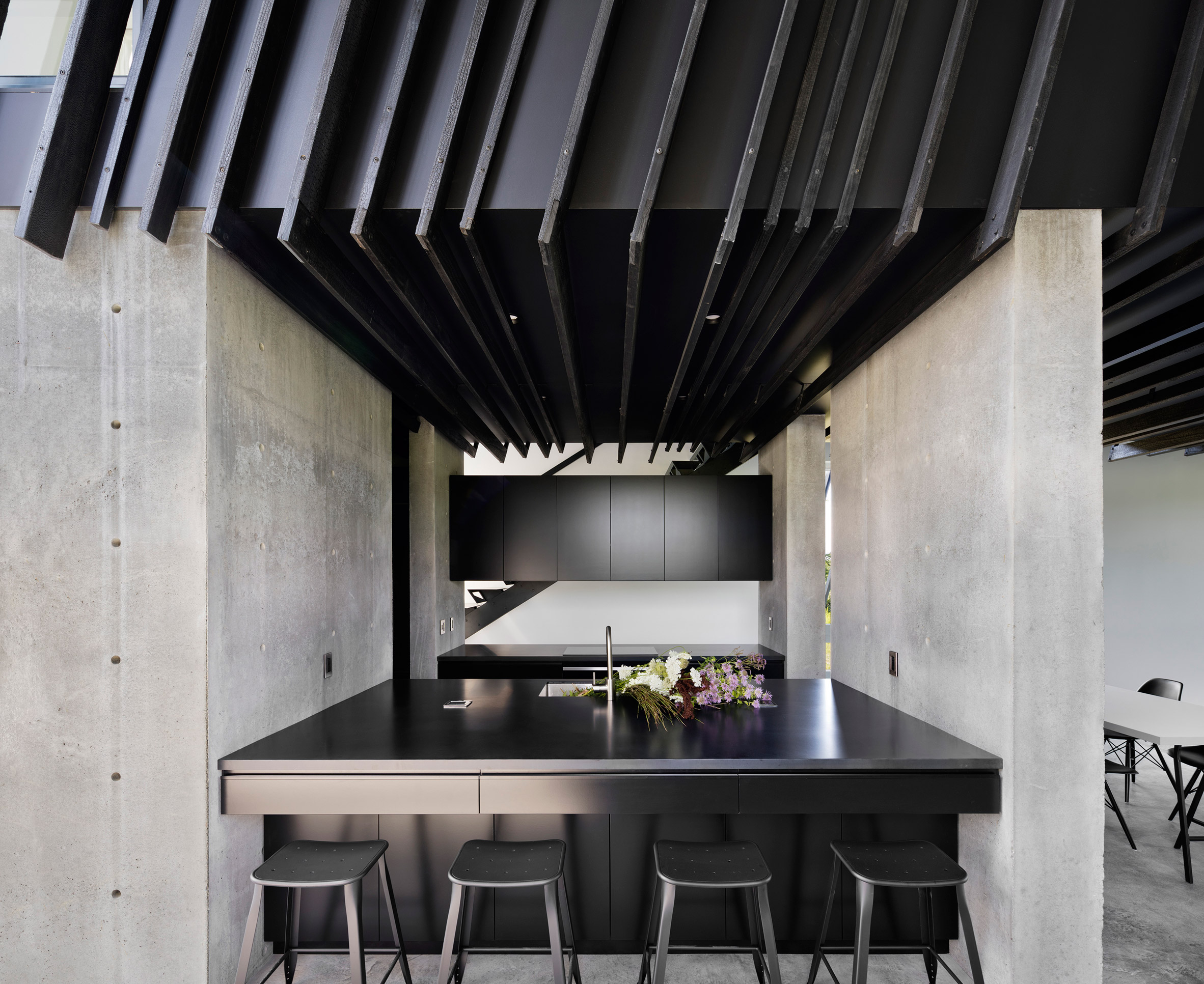 A/O builds slanted black holiday home in Hudson Valley-12