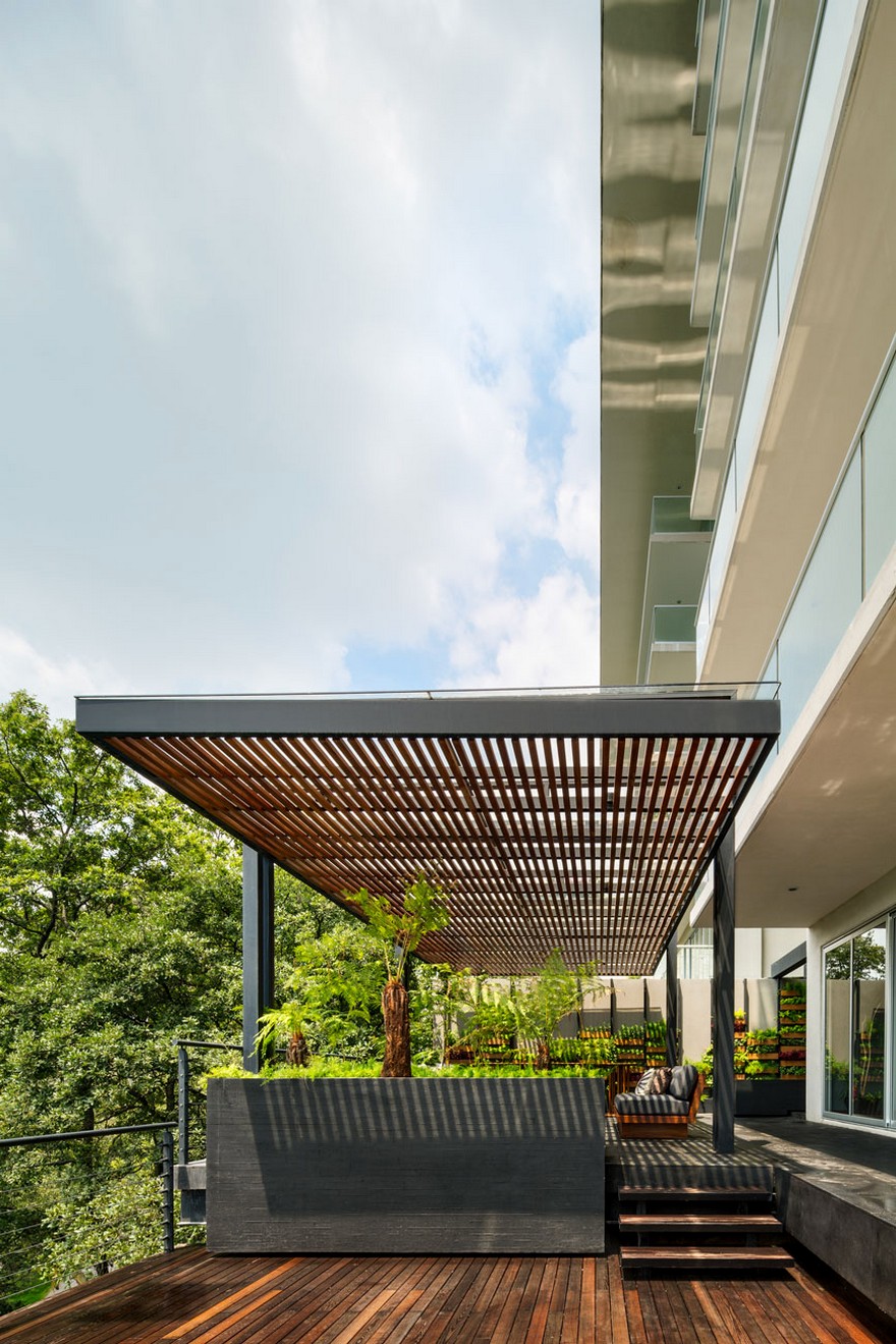 Jardin Apartment Provides a Close Connection of Living Spaces with Patios and Interior Gardens-1