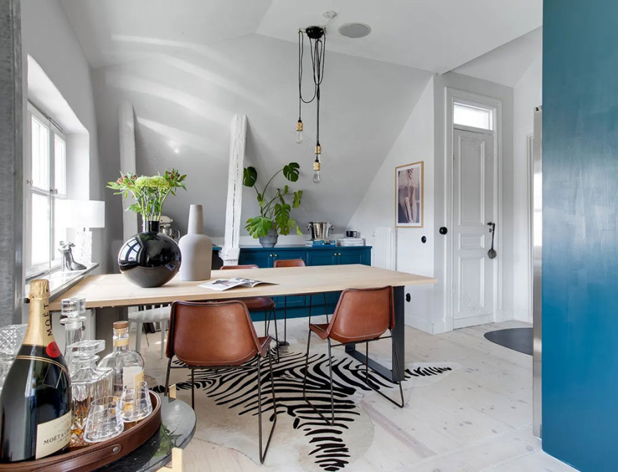瑞典优雅公寓设计,浪漫倾斜屋顶与现代装饰的完美融合-13
