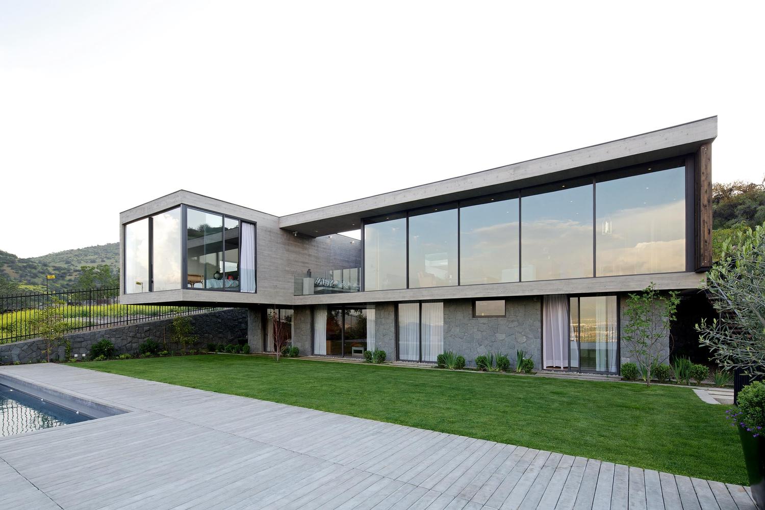 智利 PF House 丘陵景观中的宜居设计-10