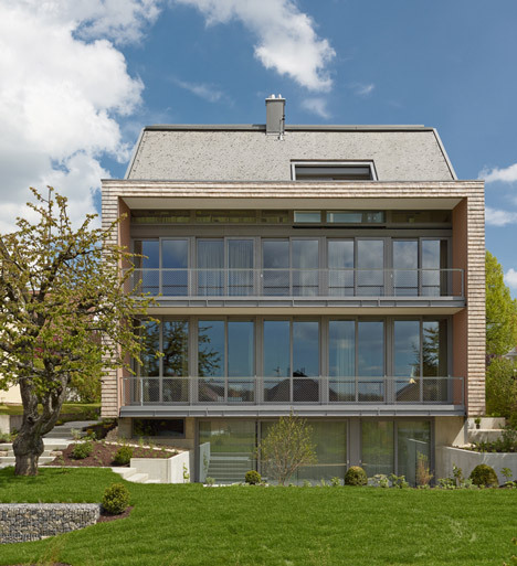 Stuttgart house by (se)arch with shingle-clad walls and an art gallery-33