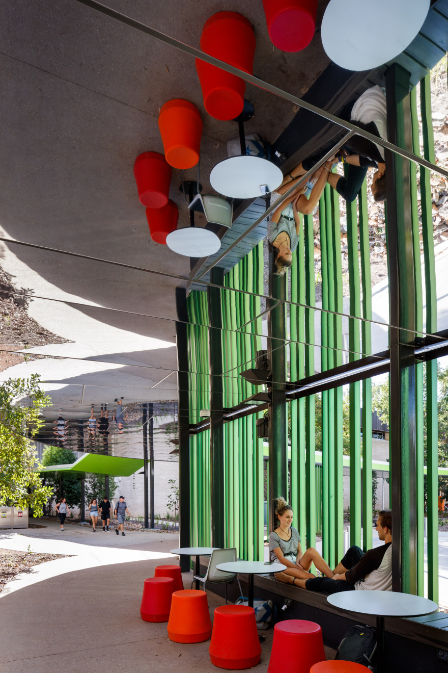 Mirrored ceilings reflect surroundings of walkway at Australian university-6