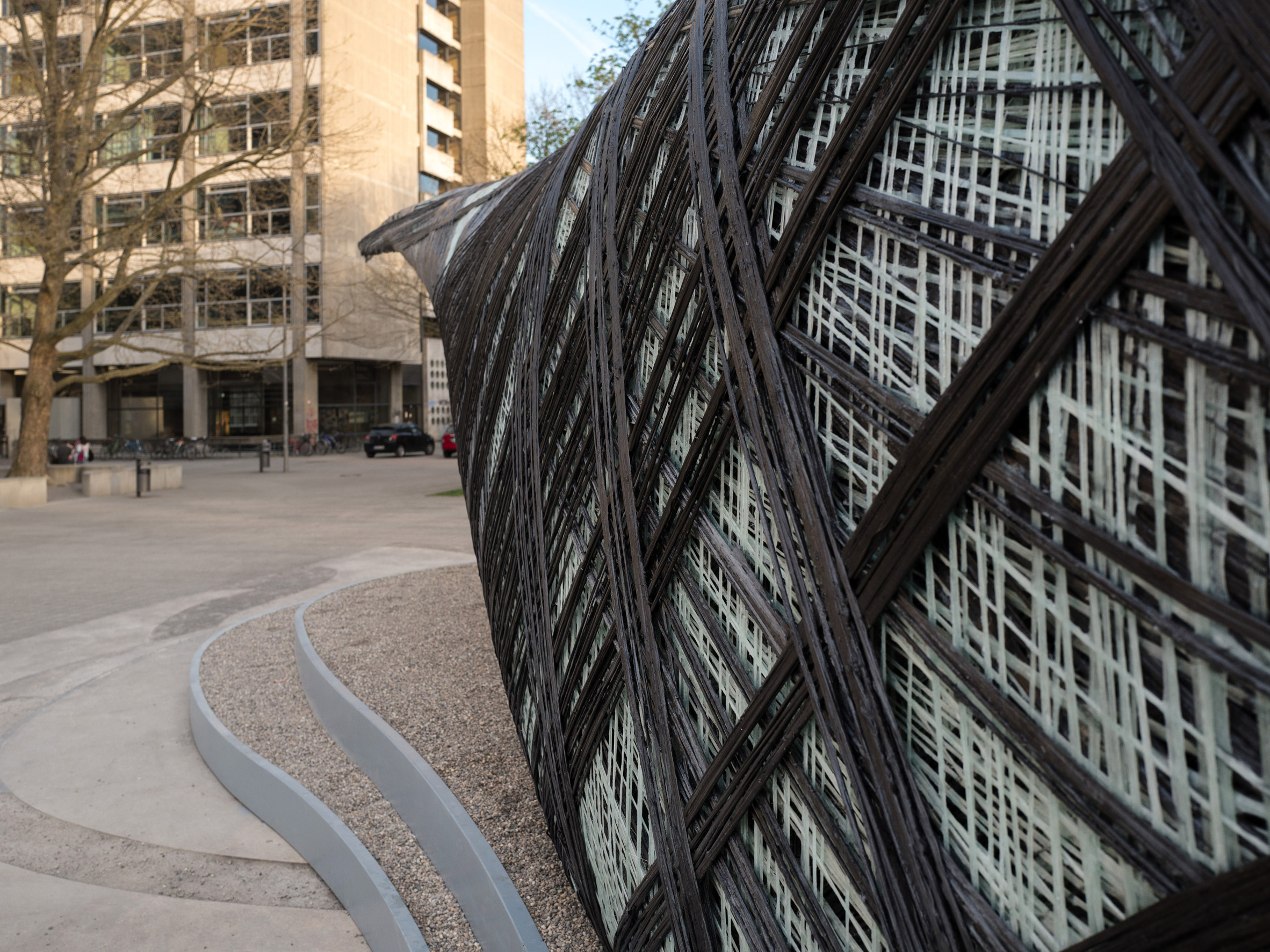 Drones and robots weave carbon-fibre pavilion based on moth webs-16