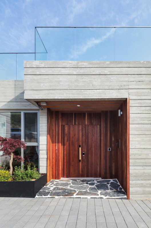 韩国海滨小屋,自然与建筑的和谐融合-28