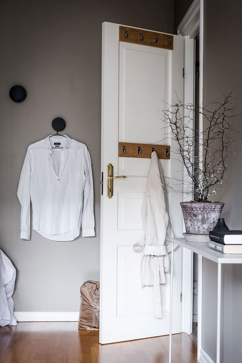 暗色调瑞典小公寓，舒适实用空间利用-5