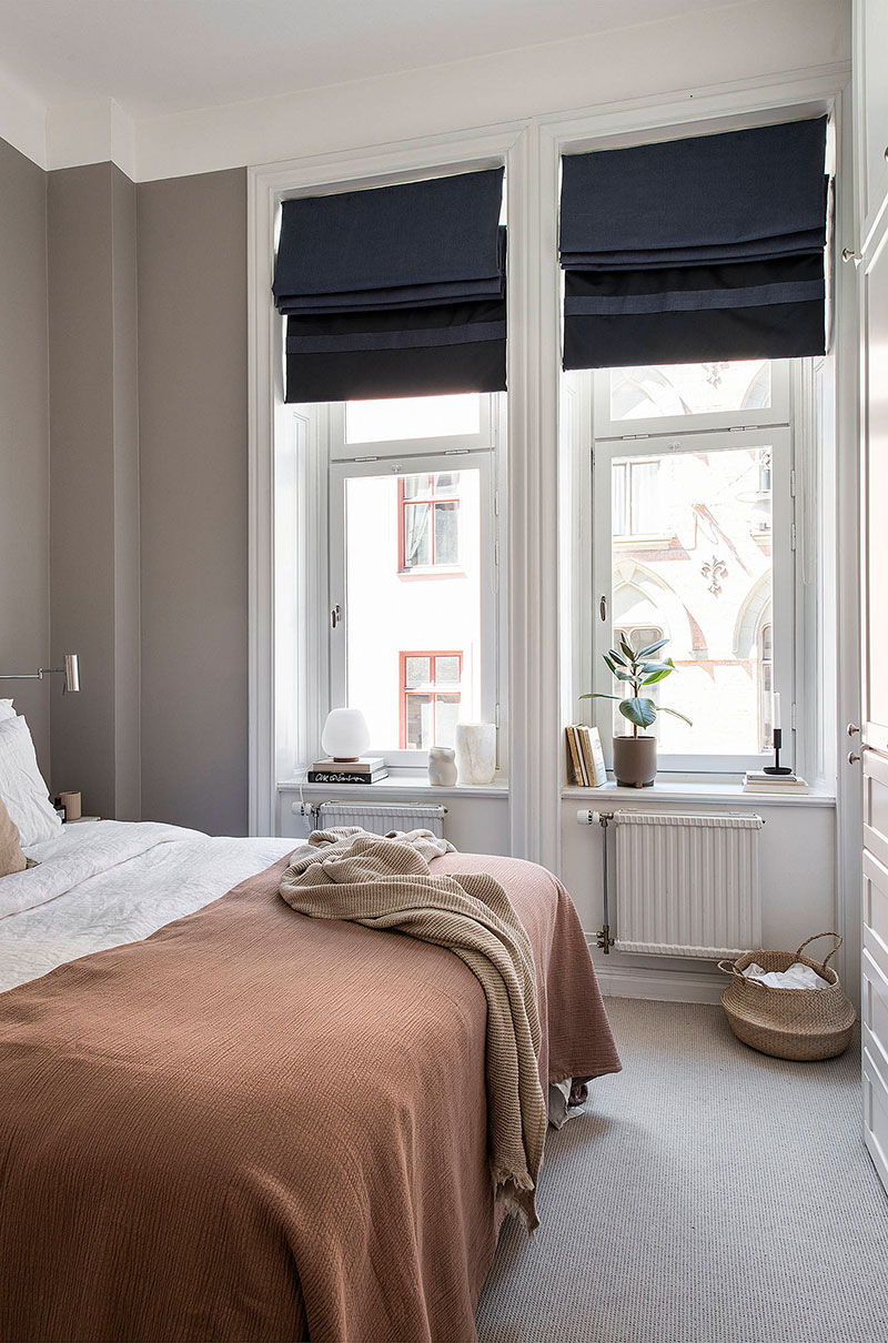 瑞典温馨公寓设计 | 书架与暖色调打造舒适空间-19