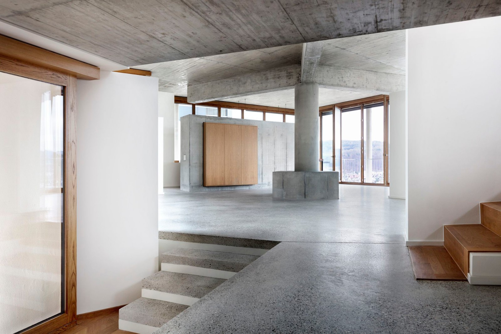 瑞士斜坡上的方形平台极简住宅-1