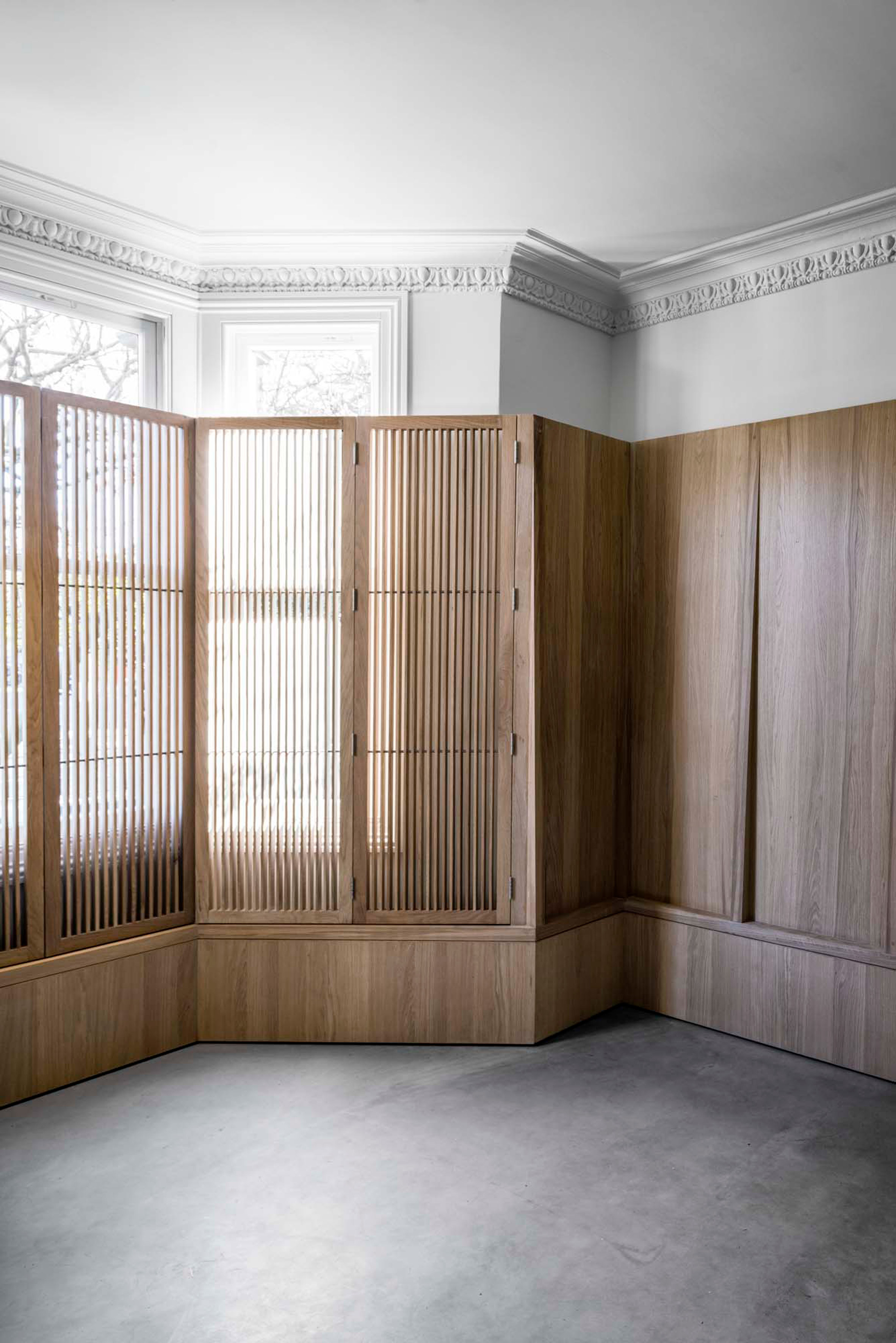 McLaren Excell adds pale-brick extension to black-painted Victorian house-20