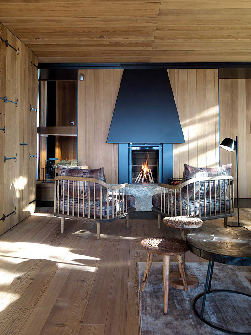 现代瑞士阿尔卑斯山滑雪坡旁小木屋-3