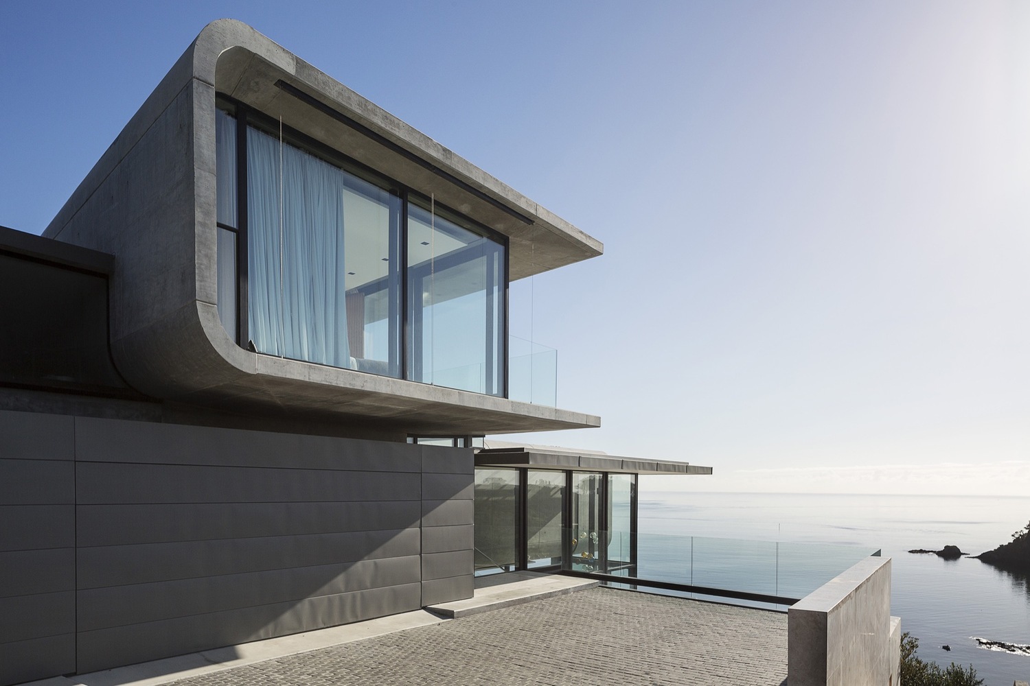 新西兰岩石海岬上的混凝土住宅(New Zealand Hekerua Bay Bay House)-4