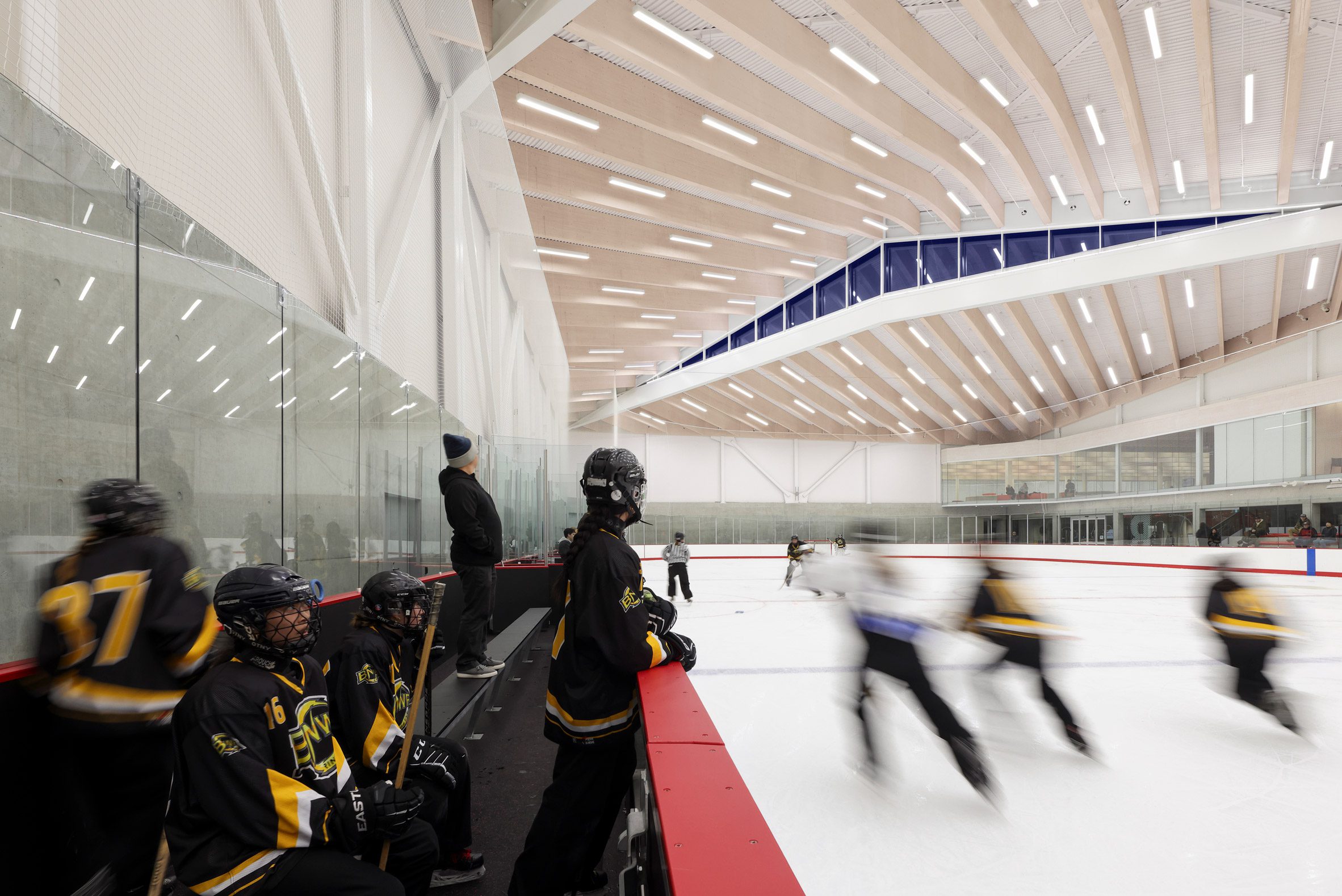 Mass timber adds visual warmth to British Columbia ice arena by HCMA-19