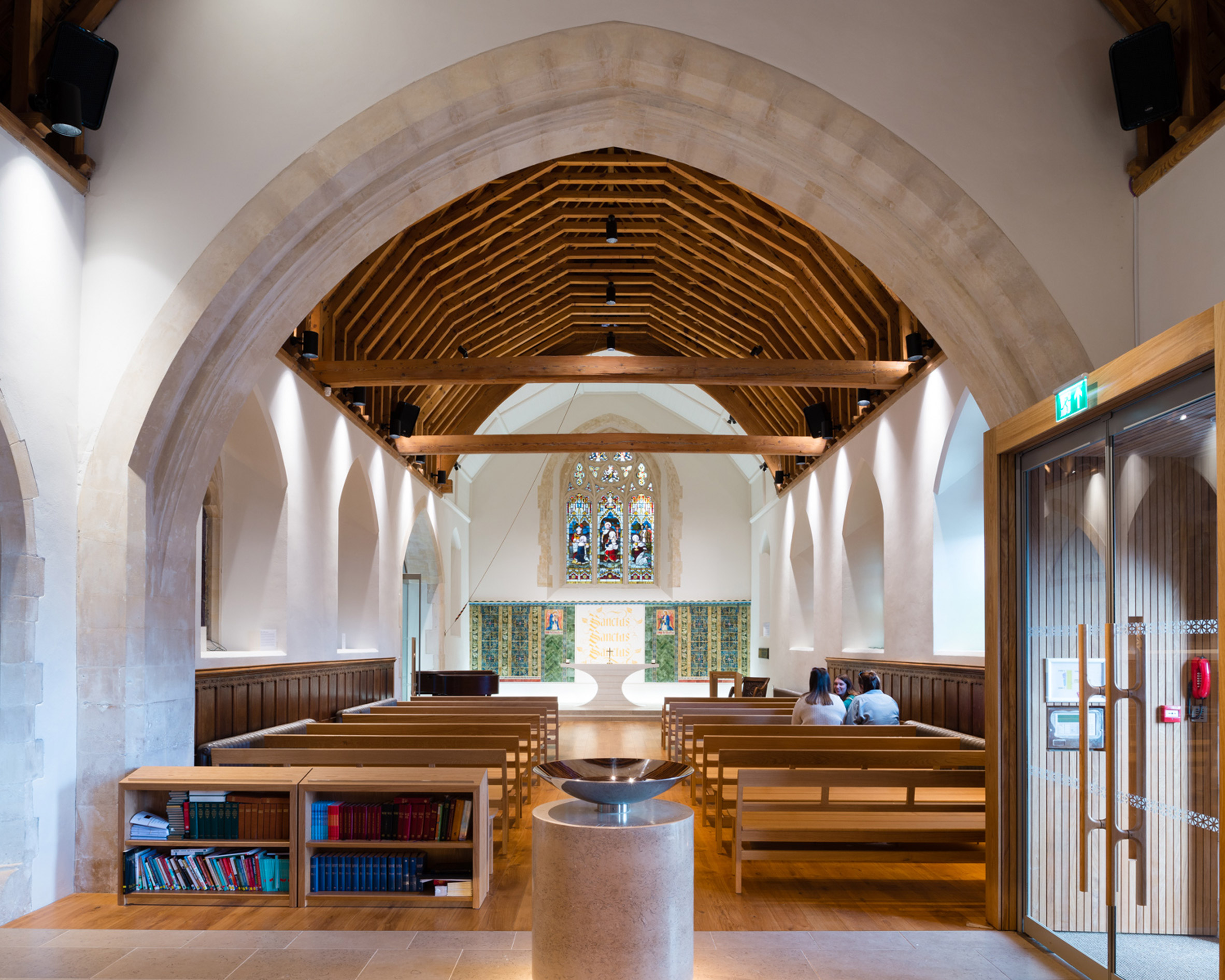 Gold extension added to Winchester university chapel by Design Engine-22