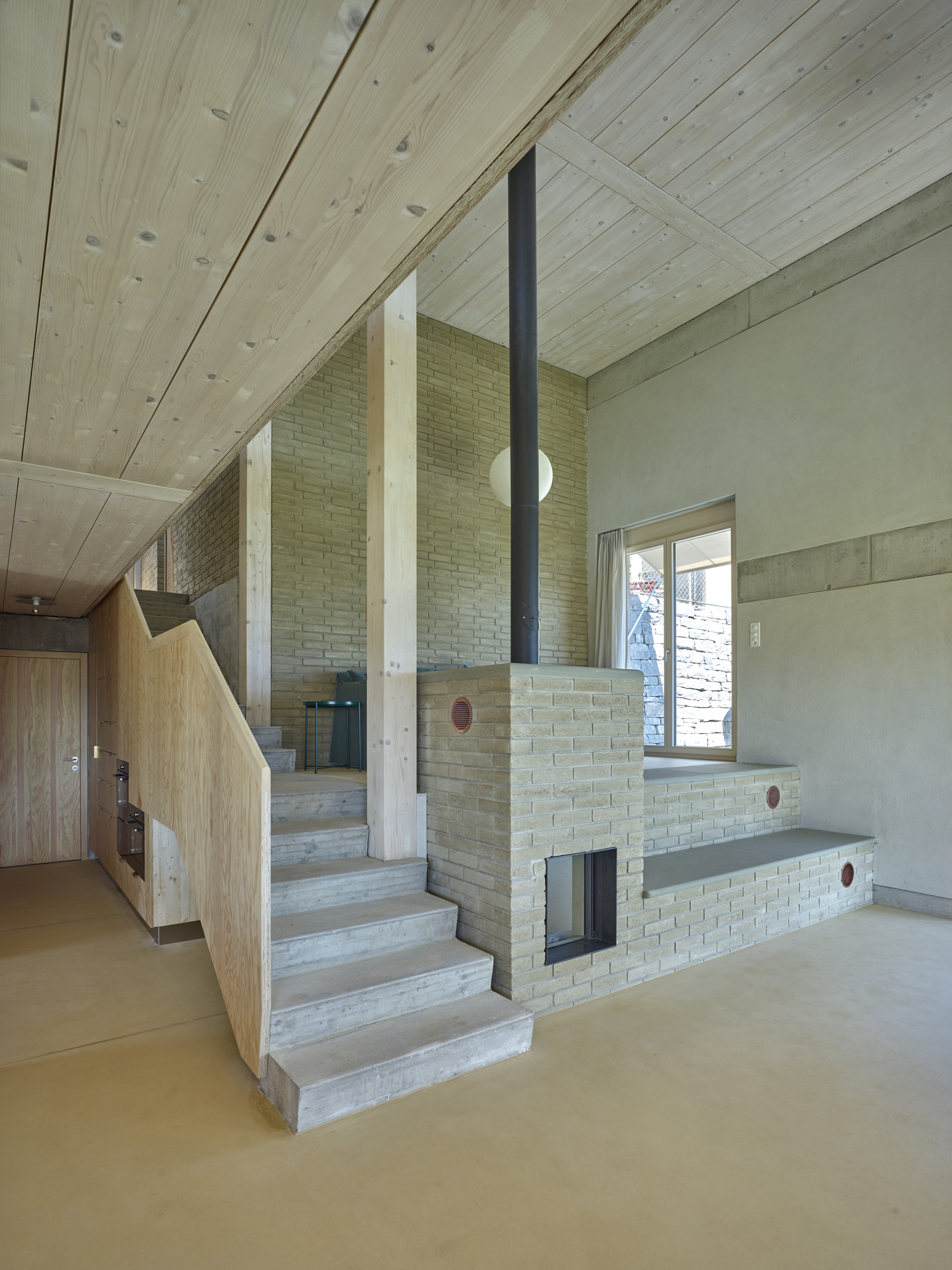 Mont Vully 两栋公寓 | 自然低排放材料打造宜居空间-1