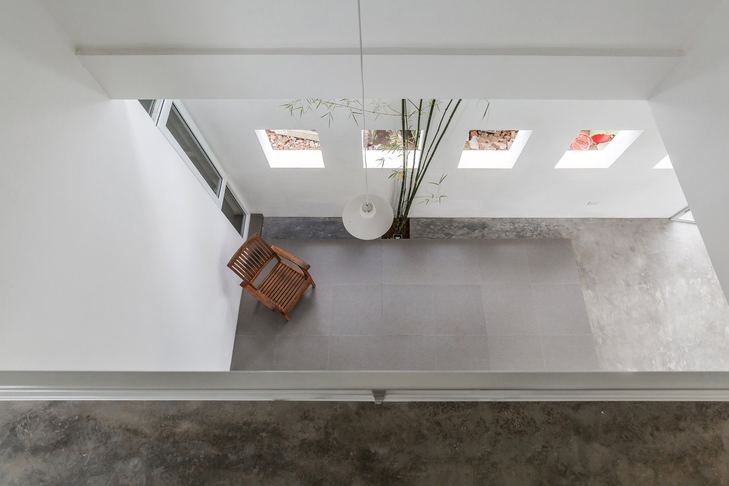 越南中部狭长土地上的共生小屋-31