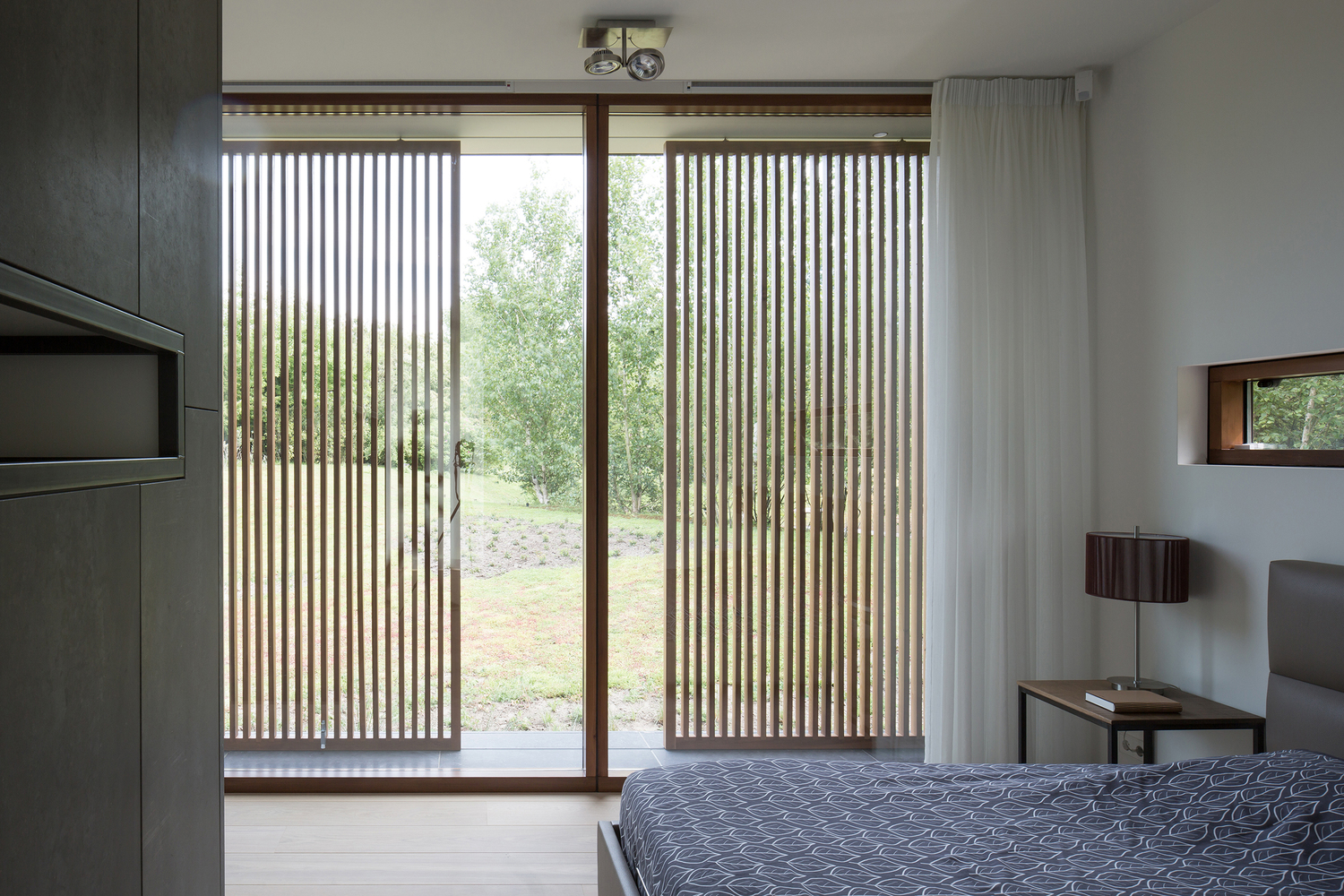 荷兰沙丘上的混凝土木构别墅-47