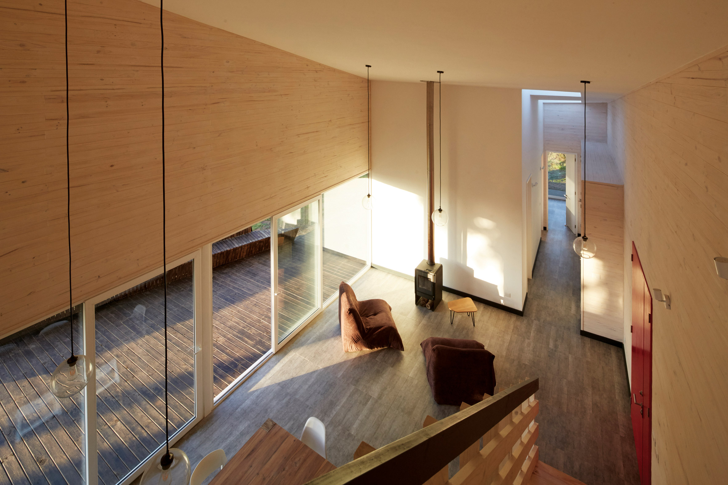 Faceted house in Chile by Verónica Arcos offers ocean views through the forest-14