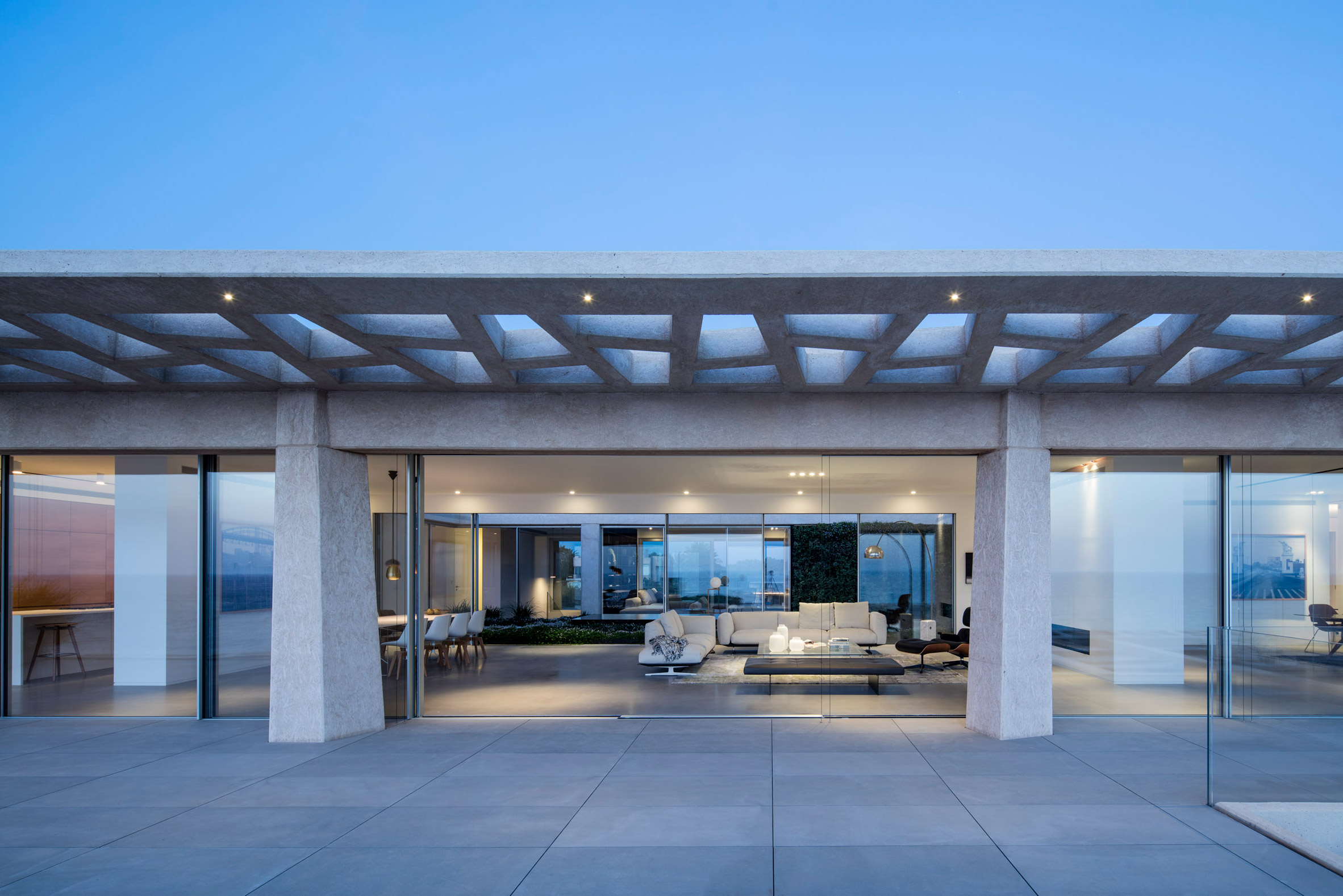 Perforated canopies shade terraces of cliff-top apartments near Tel Aviv-11