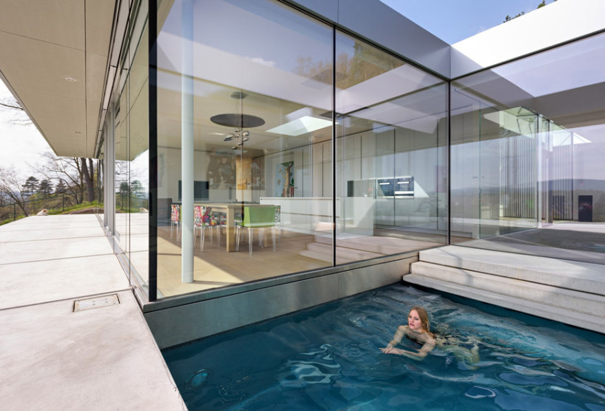 Villa K by Paul de Ruiter Architects lies long and low on a German hillside-12