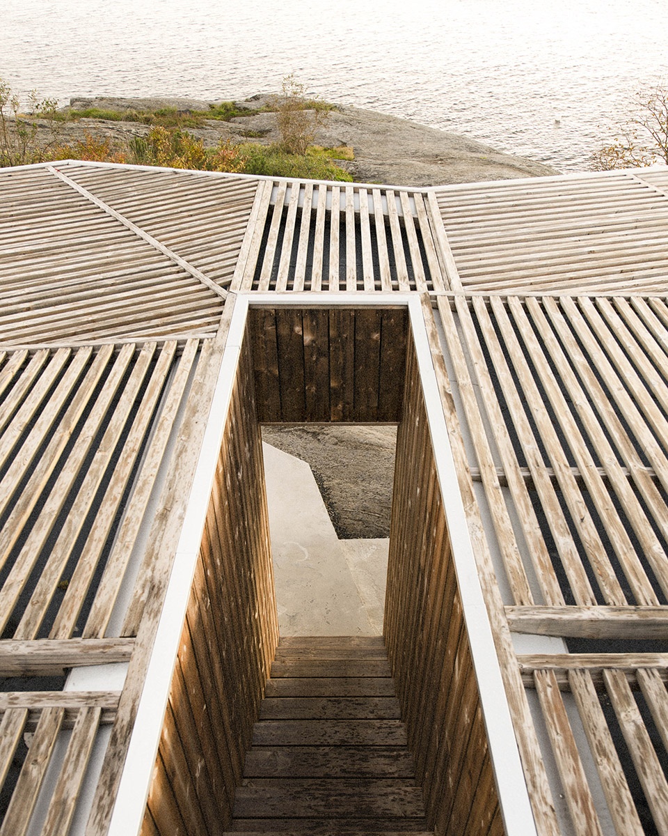 挪威弧线岩石上的岛上之家-16