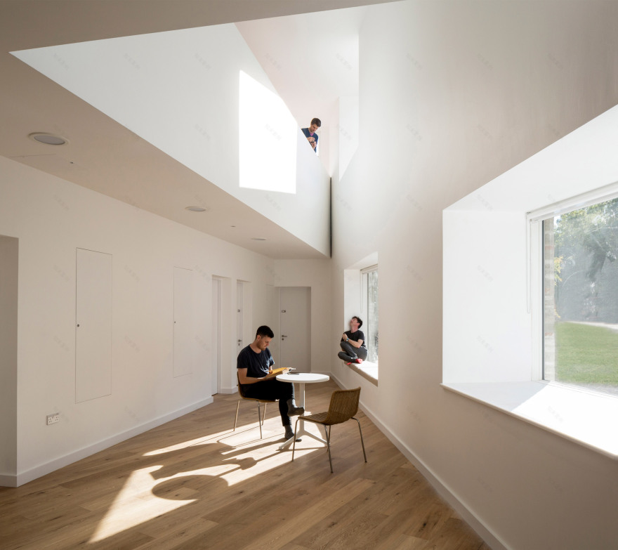 Geometric brick-clad boarding house by MICA references its neighbours-20