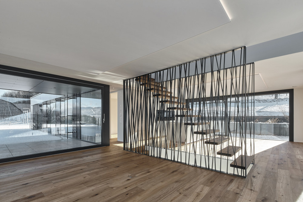 瑞士 Berna 住宅 | 融入景观的三层雕塑式建筑-18