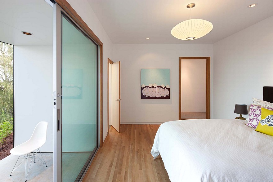 Modern Vertical House Accessed by a Steel Pedestrian Bridge-21