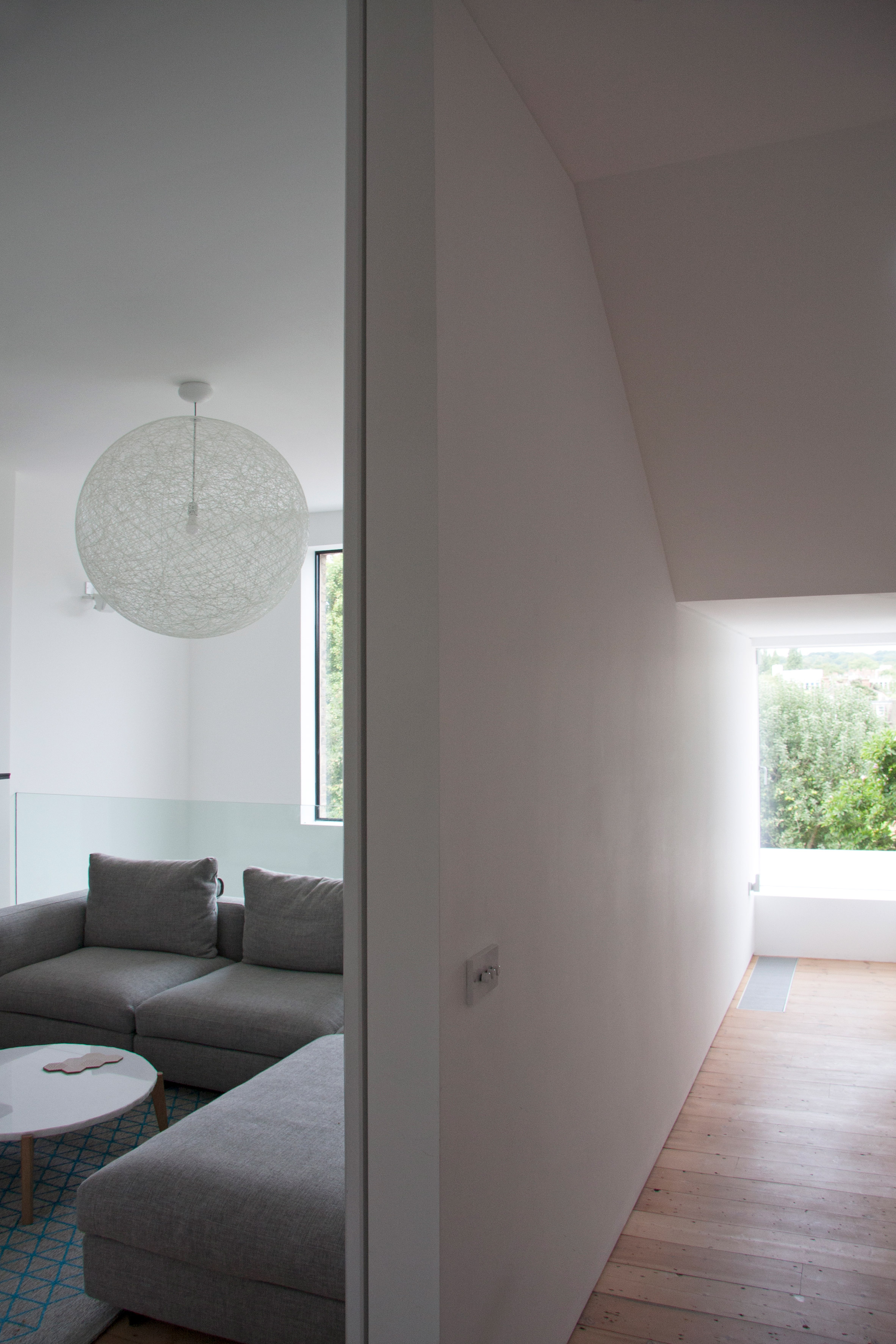 Shelving units and concealed doors compartmentalise London home-17