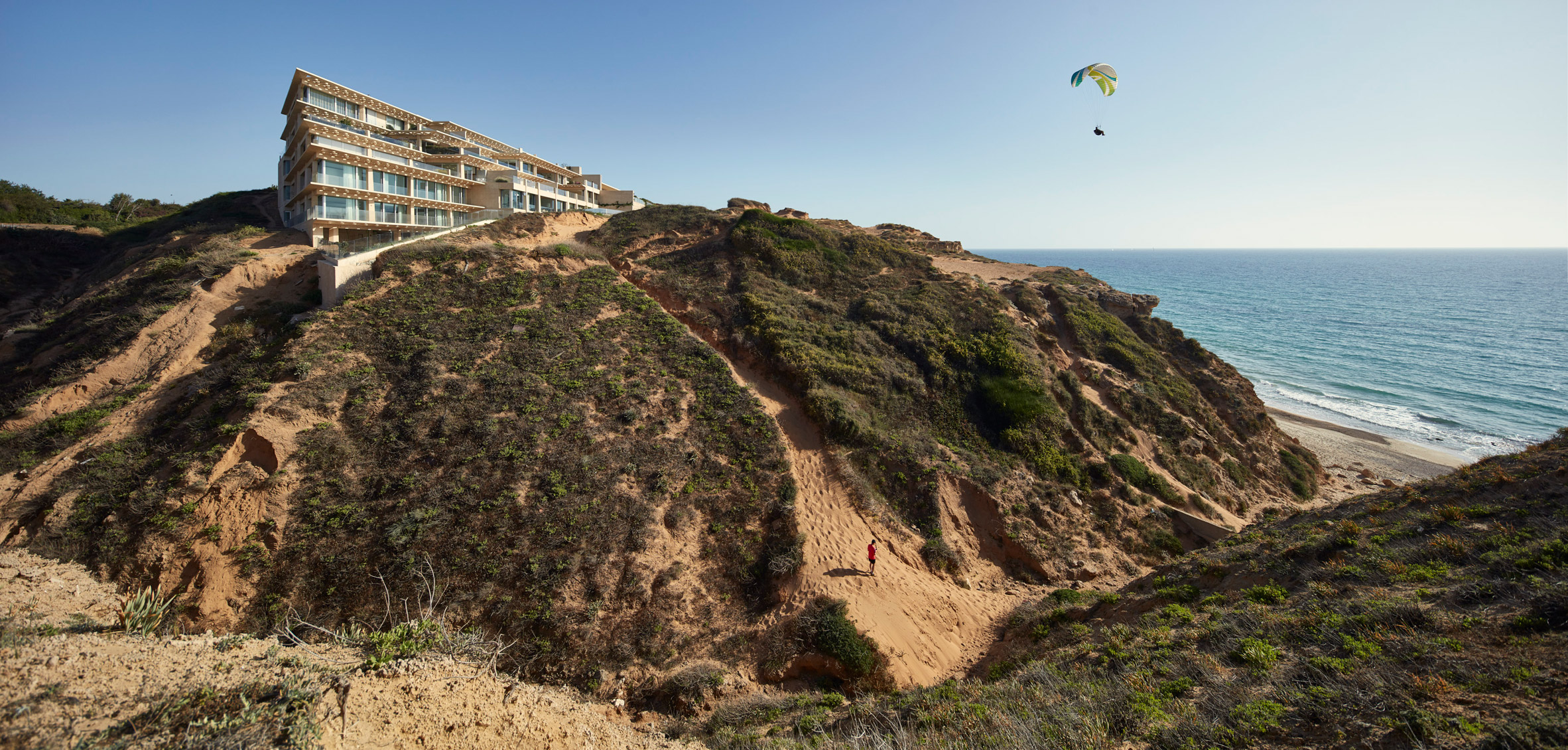 Perforated canopies shade terraces of cliff-top apartments near Tel Aviv-2