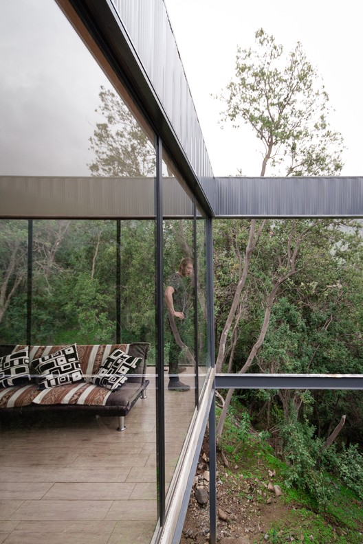 智利奥尔穆埃森林中的悬浮家庭住宅-53