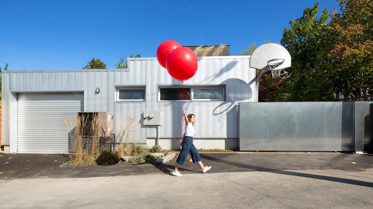 Measured Architecture has designed this modern house that opens up to a backyard patio area with a green wall   CAANdesign  Architecture and home design blog-2