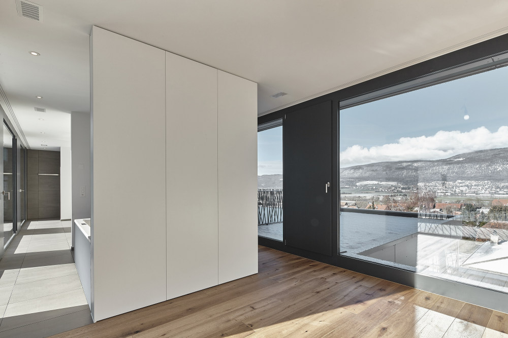 瑞士 Berna 住宅 | 融入景观的三层雕塑式建筑-26