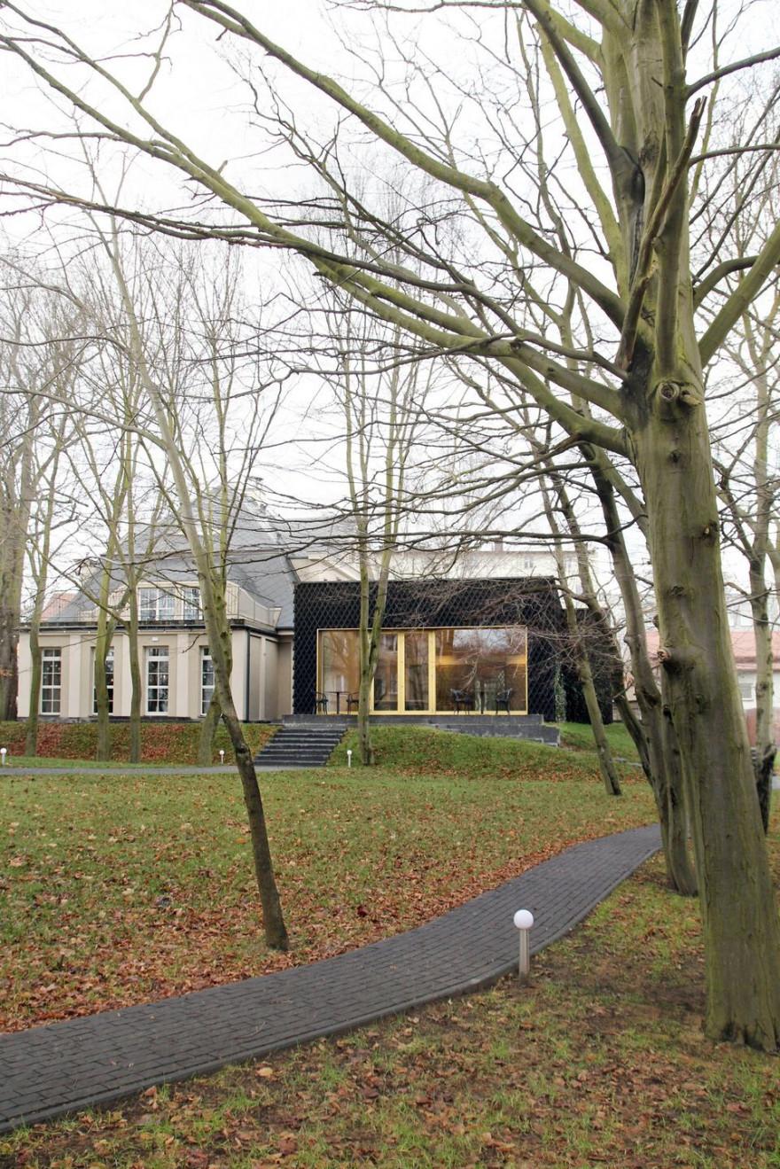 波兰历史建筑中的现代酒店设计-14