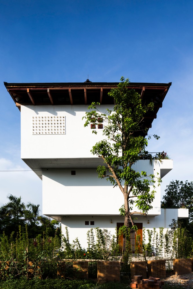 越南阶梯住宅：层层悬挑打造通透室内环境-18