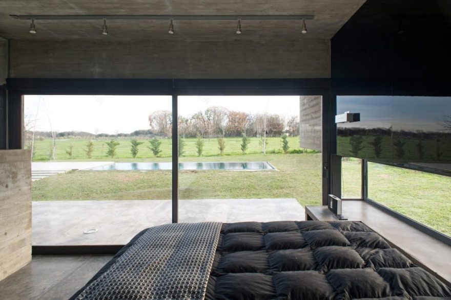 Spectacular Concrete House Surrounded by Fields and Vegetation-36