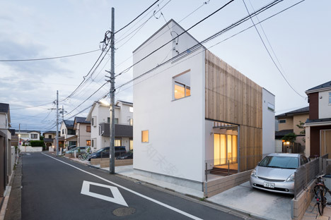 House K by Yuji Kimura Design conceals terraces behind a tall wall-32