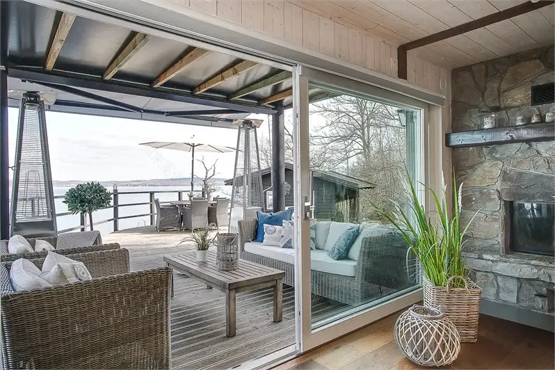 瑞典湖边百年老屋翻新,白色海洋风格度假屋-16