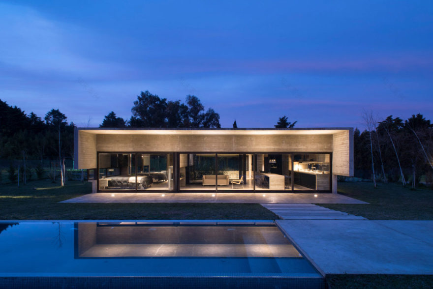 Spectacular Concrete House Surrounded by Fields and Vegetation-44