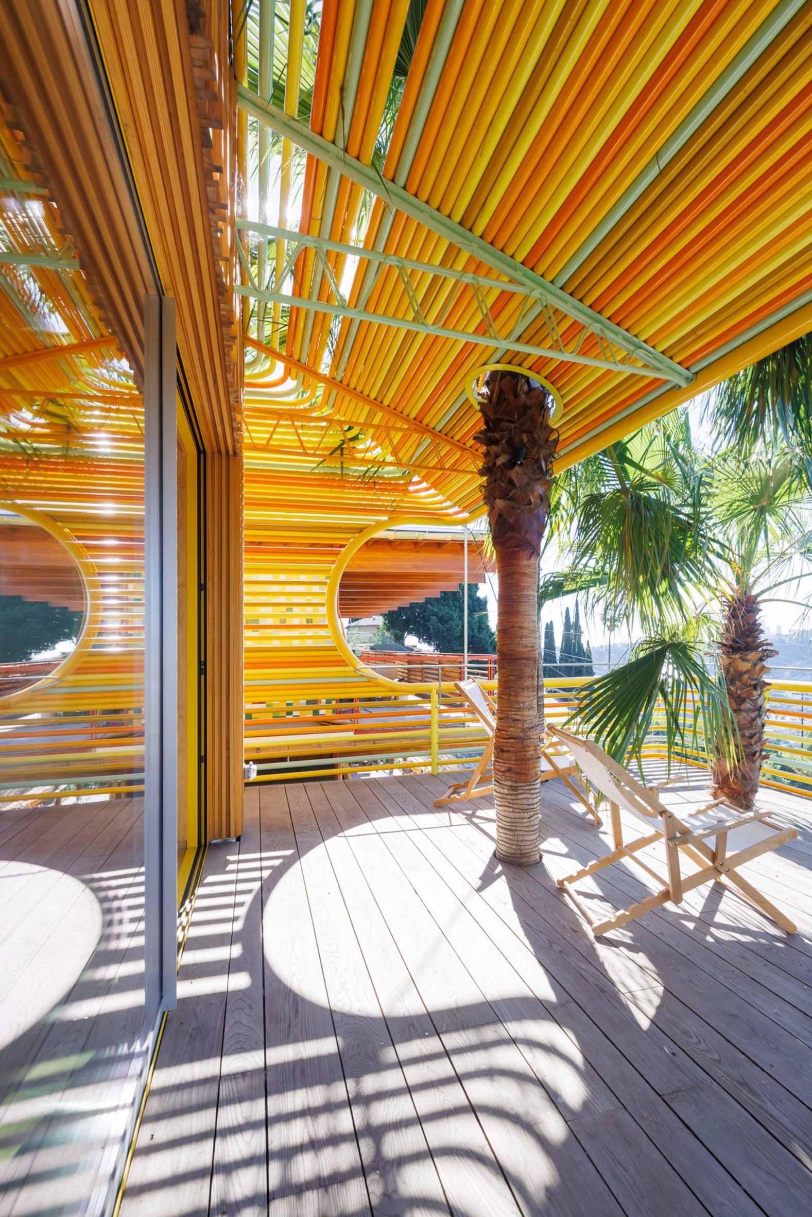 SelgasCano and Diego Cano wrap LA hillside house in colourful aluminium tubes-11